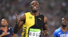 Usain Bolt aus Jamaika trägt während des 100-m-Finales der Männer bei den Olympischen Spielen goldene Turnschuhe. Archivfoto: epa/FRANCK ROBICHON