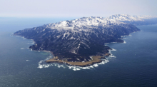 Suchaktion vor der Halbinsel Shiretoko nach starkem Erdbeben in Japan: Rettungskräfte durchkämmen Küstengewässer nach möglichen Opfern. Foto: dpa/Kyodo News