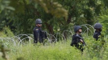 Thailändische Ranger patrouillieren im thailändisch-kambodschanischen Grenzgebiet. Foto: epa/Narong Sangnak