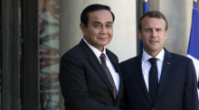 Thailands Premierminister Prayut Chan-o-cha (l.) und Frankreichs Staatspräsident Emmanuel Macron (r.). Foto: epa/Ian Langsdon