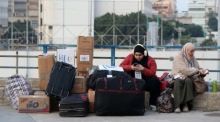 Syrische Flüchtlinge versammeln sich in Beirut zur organisierten Rückkehr in ihre Heimatorte in Syrien. Foto: epa/Wael Hamzeh