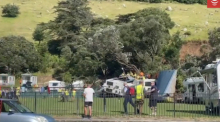 Ein Screenshot zeigt den Ort eines Erdrutsches auf einem Campingplatz in Mount Maunganui. Foto: Supplied/Radio Nz/dpa