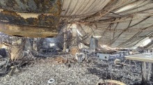 Ein Blick auf das ausgebrannte Innere des Nachtclubs in Goa, in dem es zu einem Brand gekommen war. Foto: epa/Str