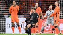 Länderspiele, Niederlande - Deutschland, Johann Cruyff ArenA. Deutschlands Thomas Müller (M) jubelt nach seinem Treffer zum 0:1. Foto: Federico Gambarini/dpa