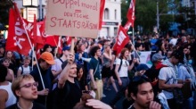 Kundgebung zum 1. Mai in Berlin. Foto: epa/Clemens Bilan