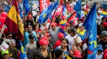 Teilnehmer an einer Demonstration zur Unterstützung des venezolanischen Präsidenten Nicolás Maduro in Caracas. Foto: epa/Rayner Peña R