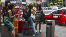 Touristen in Kuala Lumpur. Foto: epa/Fazry Ismail