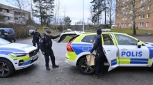 Polizei am Tatort einer Schießerei in Hovsjo in Södertälje. Foto: epa/Jonas Ekstromer