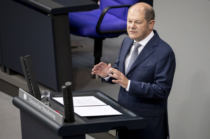 Olaf Scholz (SPD), Bundesfinanzminister, spricht im Plenum im Bundestag. Foto: Christoph Soeder/Dpa