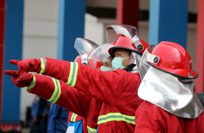 Die indonesische Feuerwehr in Jakarta. Foto: epa/Bagus Indahono