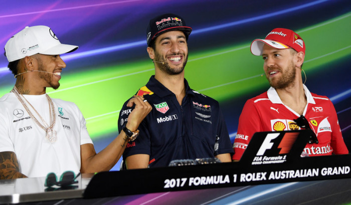 Lewis Hamilton, Daniel Ricciardo und Sebastian Vettel (v. l. n. r.). Foto: epa/