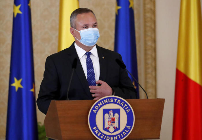 Nicolae Ciuca wird vom rumänischen Präsidenten Klaus Iohannis zum Premierminister ernannt. Foto: epa/Robert Ghement