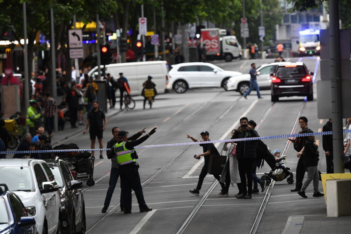 Polizeikräfte am Tatort in Melbourne. Foto: epa/Efe/JAMES ROSS