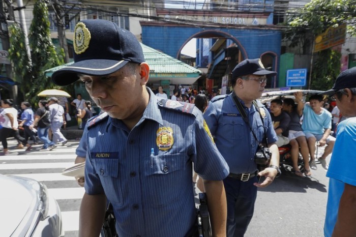 Sicherheitskräfte auf den Philippinen. Foto: epa/Rolex Dela Pena