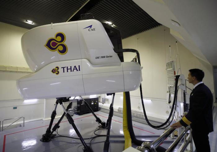 THAI bietet neu Rundflüge mit ihren Flugsimulatoren an. Foto: epa/Rungroj Yongrit