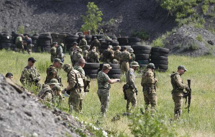 Militante der Machtabteilungen der selbsternannten Volksrepublik Donezk (DPR). Foto: epa/Dave Mustaine