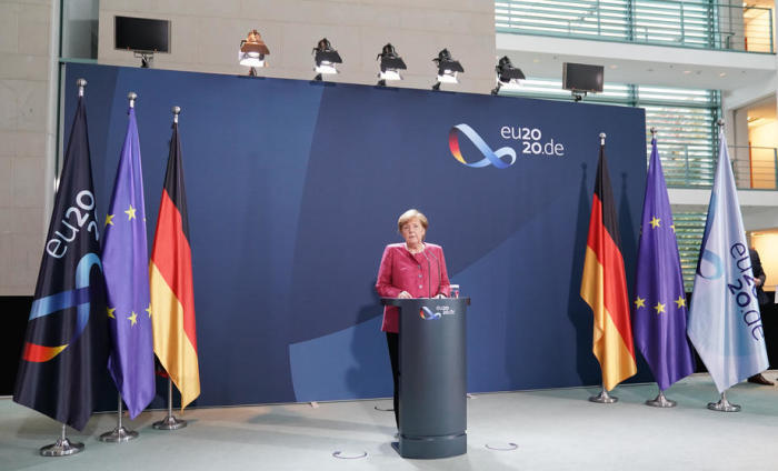 Bundeskanzlerin Merkel äußerte sich in Berlin zur Situation von Covid-19. Foto: epa/Alexander Becher