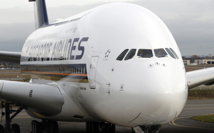 Eine Maschine des Typs Airbus A380 der Fluggesellschaft Singapore Airlines. Foto: epa/Guillaume Horcajuelo