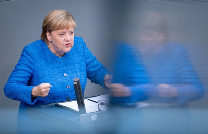 Bundeskanzlerin Angela Merkel (CDU) spricht bei der Generaldebatte im Deutschen Bundestag. Foto: Kay Nietfeld/Dpa