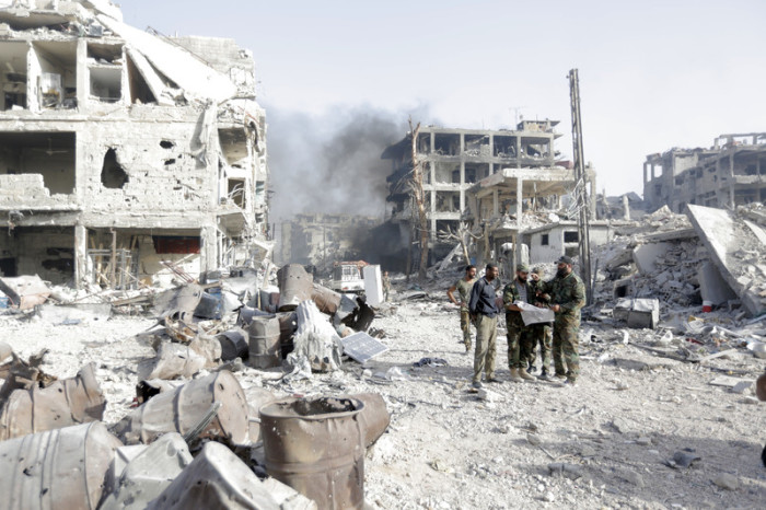 Zerstörter Stadtteil von Damaskus, Syrien, nach Kämpfen der syrischen Armee gegen IS-Rebellen. Foto: epa/