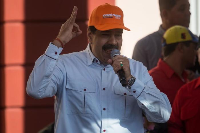 Der Präsident von Venezuela, Nicolas Maduro, spricht zu seinen Anhängern. Foto: epa/Miguel Gutierrez