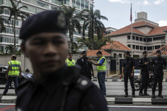 Polizisten bei einem Einsatz in Kuala Lumpur. Foto: epa/Fazry Ismail