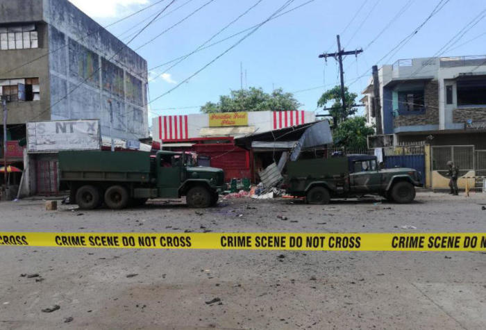 Die Streitkräfte des Kommandos der Streitkräfte der Philippinen-West-Mindanao (AFP-WMC) zeigen den Ort einer Explosion in der Stadt Jolo. Foto: epa/Afp-wmc