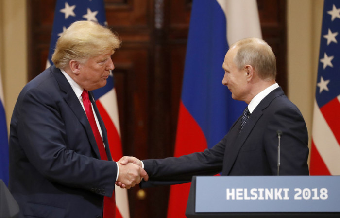 US-Präsident Donald J. Trump (l.) und der russische Präsident Wladimir Putin (r.). Foto: epa/Anatoly Maltsev