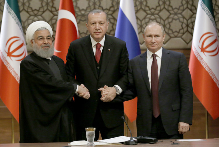 Ruhani (l.), Erdogan (M.) und Putin (r.). Foto: epa/Tumay Berkin