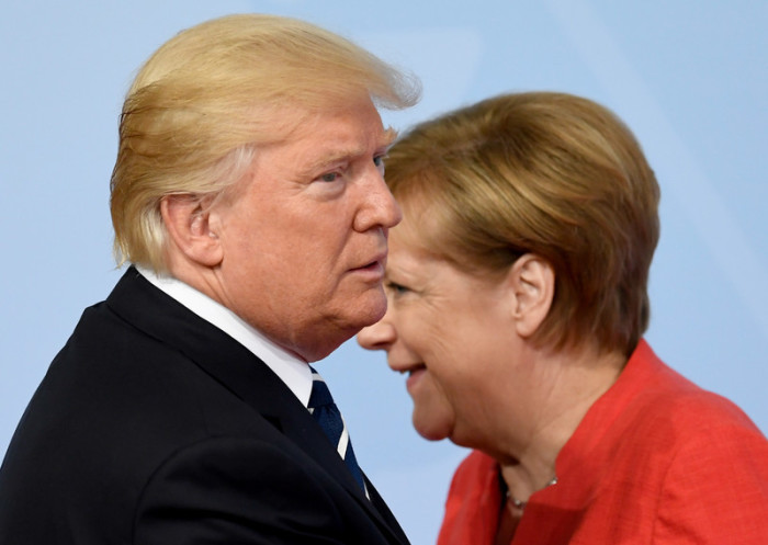 Bundeskanzlerin Angela Merkel (r.) und US-Präsident Donald J. Trump. Foto: epa/Daniel Kopatsch