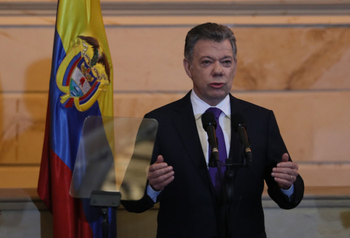 Kolumbianischer Präsident Juan Manuel Santos (M.). Foto: epa/Mauricio Dueñas Castañeda