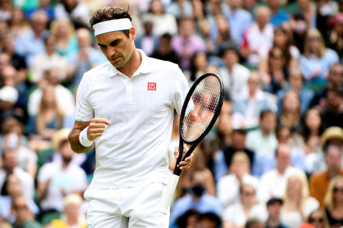 Schweizer Roger Federer reagiert während des Viertelfinalspiels der Herren. Foto: epa/Neil Halle