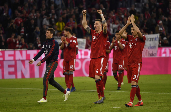 Münchens Spieler jubeln nach dem Tor zum 1:0.Foto: Sina Schuldt/Dpa