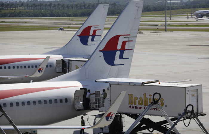 Hätte der verschwundene Flug MH370 mit besserer Technik gefunden und das bittere Drama für die Angehörigen verhindert werden können? Zwei Jahre nach dem mysteriösen Vorfall zieht die UN-Luftfahrtbehörde Konsequenzen. Foto: epa/Barbara Walton