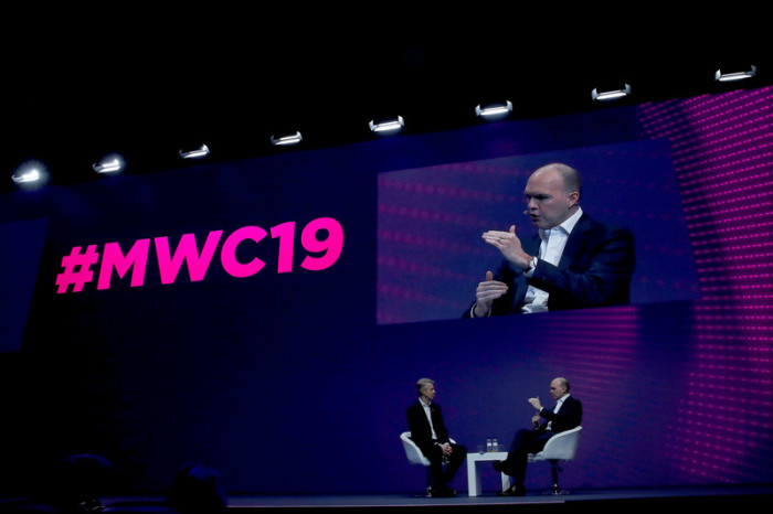 CEO von Vodafone, Nick Read (R) und Generaldirektor von GSMA Mats Granryd nahmen an einer Konferenz am Eröffnungstag des Mobile World Congress 2019 (MWC19) teil. Foto: epa/Alberto Estevez