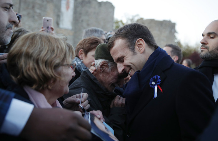Der französische Präsident Emmanuel Macron (2-r.). Foto: epa/Philippe Wojazer