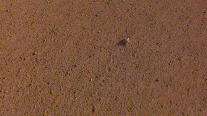 Das Foto zeigt einen Stein auf dem Mars. Die US-Raumfahrtbehörde Nasa hat einen Stein auf dem Mars nach den Rolling Stones benannt. Foto: NASA/Jpl-caltech/dpa