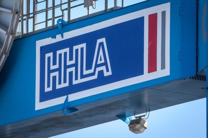The logo of port operator Hamburger Hafen und Logistik AG (HHLA) in Hamburg. Photo: epa/FOCKE STRANGMANN