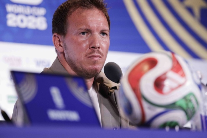 Julian Nagelsmann beantwortet auf einer Pressekonferenz vor dem WM-Sechzehntelfinale gegen Paraguay Fragen der Medien. Foto: EPA/Shawn Thew