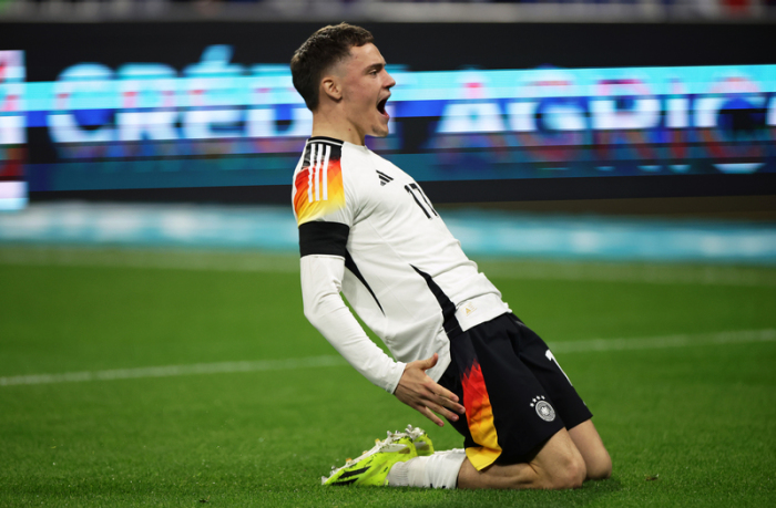 Deutschlands Florian Wirtz jubelt nach seinem Treffer zum 1:0. Foto: Christian Charisius/dpa