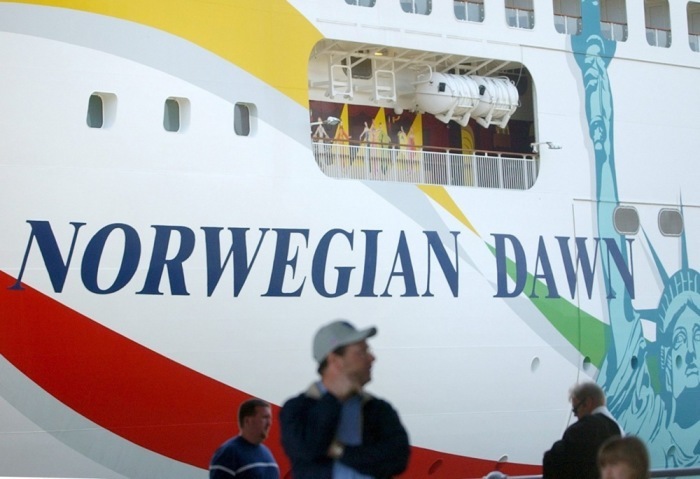 Fahrgäste, die sich auf dem Kreuzfahrtschiff Norwegian Dawn befanden. Foto: epa/Justin Lane