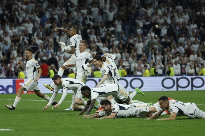 Real Madrids Spieler feiern den Sieg im Halbfinale der UEFA Champions League. Foto: epa/Juanjo Martin