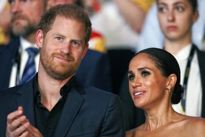 Prinz Harry, Herzog von Sussex (L) und Meghan, Herzogin von Sussex, Großbritannien. Foto: epa/Christopher Neundorf