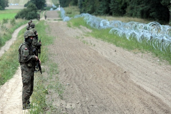Die Flüchtlingskatastrophe an der polnisch-weißrussischen Grenze. Foto: epa/Artur Reszko Polen Out