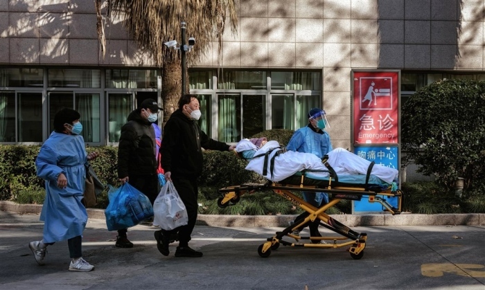 Kliniken in China sind mit der steigenden Zahl der COVID-19-Fälle überfordert. Foto: epa/Alex Plavevski