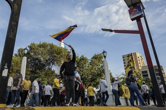 Demonstranten in Maracaibo fordern die Freilassung politischer Gefangener und des Oppositionellen Juan Pablo Guanipa. Foto: epa/Henry Chirinos