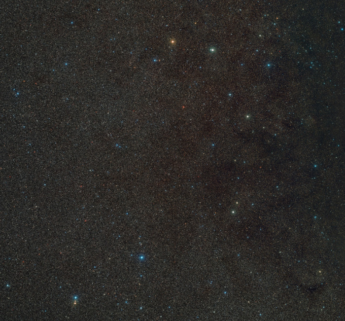 Ein Weitwinkelausschnitt der Umgebung von Gaia BH3, dem massereichsten stellaren schwarzen Loch in unserer Galaxie. Das schwarze Loch selbst ist hier nicht sichtbar. Foto: D. De Martin./Eso/digitized Sky Survey 2./dpa