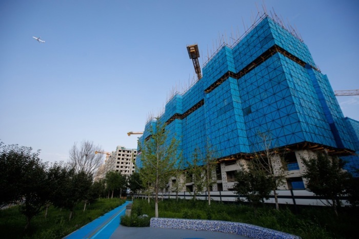 Überblick über eine Baustelle für Wohngebäude des Unternehmens Country Garden in Peking. Foto: epa/Wu Hao