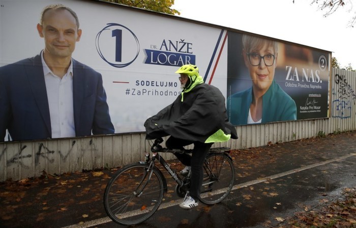 Vor der zweiten Runde der Präsidentschaftswahlen in Slowenien: Wahlplakate der Präsidentschaftskandidaten. Foto: epa/Antonio Bat