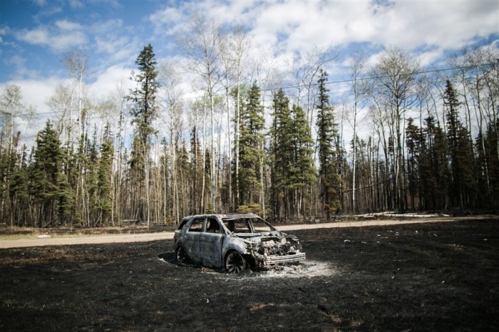In Alberta, Kanada, brennen nach wie vor weite Gebiete von Waldbränden. Foto: epa/Amru Salahuddien